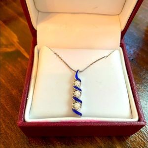 Diamond necklace with sapphire accent